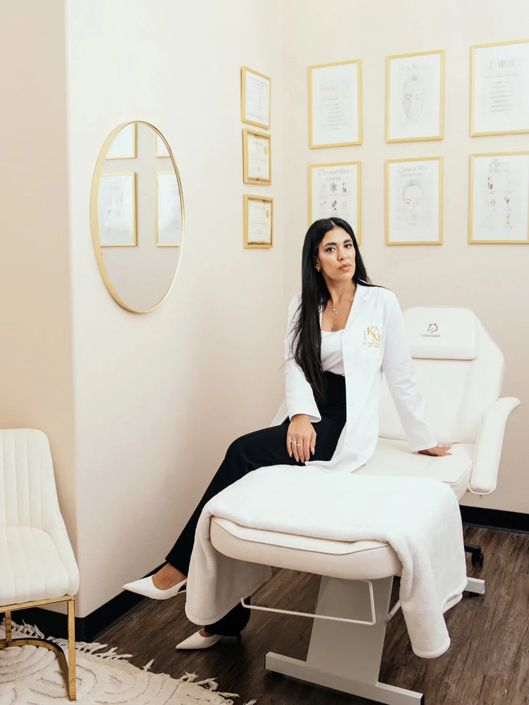 Koral, founder and injector at KM RX Aesthetics, seated in the Bellaire studio